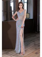 Färgglada kändisklänningar ärmlös illusion midje design sida slits sjöjungfru elastisk paljett tassel v-hals fest sexiga prom klänningar