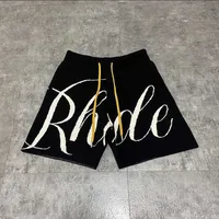 Designer Clothing Rhude American High Street Pocket Embossed Letter Knitted Drawstring Capris Men&#039;s Women&#039;s Loose Casual Shorts Couples Joggers Sportswear