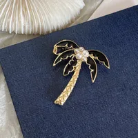 Con caja de lujo diseñador de chanza broches para mujer pasadores de oro broche de palma de cacao traje de traje para dama especificaciones de diseñador joyería
