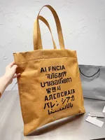 2023 New seven-country letter paper bag shopping Tote couple Japanese Korean casual shoulder hand