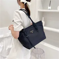 2023 Cheap Handbags Online 90% off New triangle classic versatile canvas one shoulder large capacity tote shopping nylon portable bag