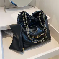 2023 Bags Outlet Online sale New Shopping Soft Leather Large Capacity Chain Ringer Bucket Single Shoulder Garbage Tote Bag