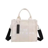 The Toates Bags Kadın Moda Omuz Alışveriş Tasarımcı Çantaları Ünlü Büyük Kapasiteli Düz Mektup PU Deri Para Çantası Sıradan Crossbody Serin harika cüzdanlar