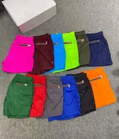 Дизайнеры мужские шорты 12 цветов короткие мужчины и женщины летние быстросохнущие водонепроницаемые повседневные пятибалльные брюки размер S --- 3xl
