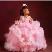 2023 Pink Flower Girl Dresses Jewel Neck Ball Gown Lace Appliques Beads Feather Tulle Kids Girls Pageant Dress Birthday Gowns Ruffles Tiered Long Sleeves