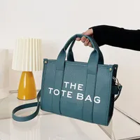 The Toates Bags Kadın Moda Omuz Alışveriş Tasarımcı Çantaları Ünlü Büyük Kapasiteli Düz Mektup PU Deri Para Çantası Günlük Crossbody Serin Büyük Cüzdanlar A1