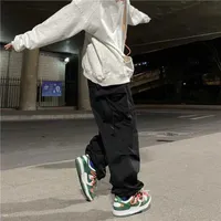 Pantalones para hombres al estilo de paracaídas hip-hop overs de bolsillo de gran tamaño Harajuku suelto color sólido y2k patado Y2302