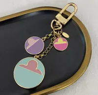 cazibe toptan lüks tasarımcı anahtarlık moda klasik marka anahtar çiçek mektubu anahtar zinciri el yapımı anahtar zincirleri erkek kadın çantaları kolye hediyesi