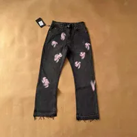 Jeans jeans designer vintage jean cuore incollato in pelle lavati i pantaloni jeans dritti vintage