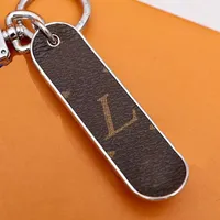 Ontwerpers Keychains Luxurys Keychain Solid Color Letters Keychain Fashion Casual Classic Key Chain Gift Skateboard TrendykeyChain 2 Col292R