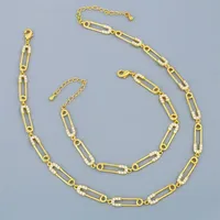 FLOLA Gold Safety Pin Naszyjnik dla kobiet CZ Micro Pave Charm łańcuch Naszyjnik Naszyń