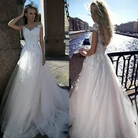 Bohemian A Line Wedding Dress 2019 Cap Rękaw Zastosowana koronkowa sukienka Bride Boho For Girl Lace-Up Back Wedding Suknia Vestidos255k