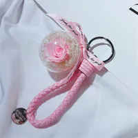Schlüsselketten romantische kreative natürliche ewige Rosenblütenschlüsselketten Frauen Mädchen PU Leder geflochten