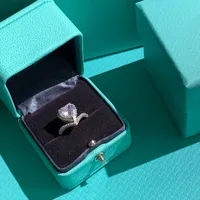 Anillos de compromiso de dise￱ador Juego para mujeres Pareja Silver Color Heart Shape Ring Joyer￭a de moda deslumbrantes