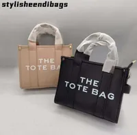 The Toates Bags Kadın Moda Omuz Alışveriş Tasarımcı Çantaları Ünlü Büyük Kapasiteli Düz Mektup PU Deri Para Çantası Günlük Crossbody 0226/23