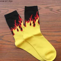 Calcetines de la tripulación de llama amarilla roja calcetines de fuego vitalicias