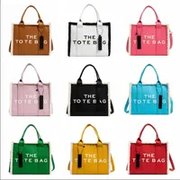 The Tote Bag Marc Totes Bag Women Dise￱ador Bolsas de bolsos Moda de mano All-Match Shopper Shoulder Bolsos de cuero Tama￱o 28/23/13CM