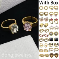 Anillo de diseñador de alta calidad anillos de banda de acero inoxidable Damas Vintage Regalo Pink Diamond Pequeño Fresh y Dulce Ring Dongjewelrys
