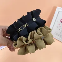 Letras de diseño de marca Impresión Bowknot Laciness Diadema para mujeres Corea vintage Retro ancho de borde de borde para el cabello para al aire libre Accesorios de turbante para al aire libre