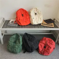 حقيبة الظهر الظهر غير المطبوعة على ظهر حقيبة القماش الصلبة حقيبة مدرسية بسيطة للأعمار الرجال والنساء