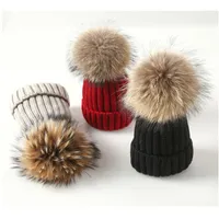 Mujeres de invierno Beanie Real Raccoon Fur Pompom Sombrero para niños Hembra Cálida gruesa espesa sombreros elásticos