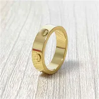 Titanium Steel Love Ring And Silver Rose Gold Band para mujeres Anillos de compromiso de compromiso Hombres Joyas de joyas Barco256o