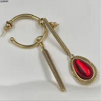 Ny designad dingrle nitskalle ruby ​​asymmetriska kvinnor män pärla örhängen öronhopp punk stil halsband armband damer örhänge studs designer smycken amq-10