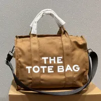 Marc The Bag Bag عالية الجودة قماش اليد القماشية قابلة للإزالة واسعة الحزام السوستة إغلاق رسائل الأزياء
