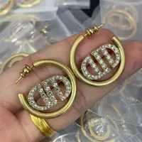 Circle d list Diamond Ear Studs kolczyki 18K Gold Plated Ear's Clip Kolczyki metalowy niechętny projektant biżuterii DR7 -71 Luksusowa biżuteria