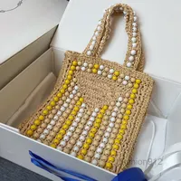 이브닝 가방 2022SS New Beads Straw Tote 가방 직조 패션 쇼핑 가방 여성 핸드백 3 색 최고 품질 크로 셰 뜨개