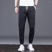 Мужские брюки Ymwmhu 2022 Прибытие мужская тонкая летняя спортивная брюк мужская твердая модная уличная одежда плюс размер