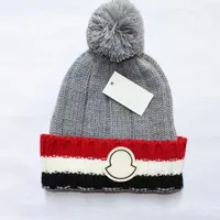 2022 Mengjia New Thebsknated Hat قبعة محبوكة عالية الجودة مع الكرة والبزيرة الخريف والشتاء دافئ الموضة قبعة العلامة التجارية