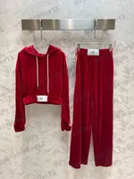 Dames tracksuit jogging pak letter logo rood fluweel tweedelig sets capuchon met capuchon bijgesneden lange mouwen sweatshirt en losse poetsenbroeken