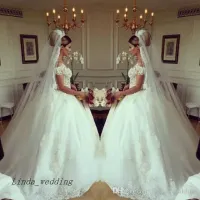 2023 Ball Gown Wedding Dresses Bridal Lace Applique Off the Shoulder Neckline Sweep Train Custom Made Plus Size Garden Tulle Vestidos de novia