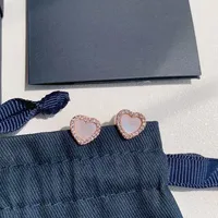 S925 Серьмы стерлингового серебряного серебряного розового сердца для женщин -дизайнер бренда Shining Diamond Swer