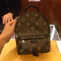 Bolsas de grife cl￡ssicas Mini bolsas de tamanho escolar de couro Mulheres e crian￧as Backpack Lady Travel Bag ao ar livre Millionaire Old Flower Bolits Glitter