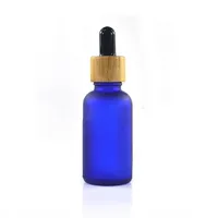 Frosted Clear Amber Blue Green Glass Serum Essential Oil Bottles 30 ml with Dropper Pipette And Bamboo Cap