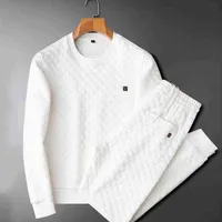 Suricideros para hombres 2022 Light Luxury Stand Collar White Casual Sport Swits Slim Spring y Autumn Knited Fitness Trend Sportswear Sportswear T220916