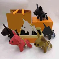 Designer Keychains Cartoon Animal Piccolo cane Accessori della catena chiave creativa Accessori per lettere in pelle PU Modello di lettere per auto -gioielli