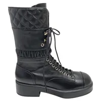 Черные кожаные стеганые боевые ботинки/пинетки для кожи и коелевые ботинки для сплайсинга с шпсацией с высотой каблуки 4,5 см.