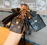 Designer Bag Keychains PU Leather Key Rings Chains Jewelry Brown Flower Pendant Bag Charms Keyrings Car Keys Holder for Men Women