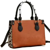 Tasarımcı totes kadın pm onthego alışveriş çantası klasik pu orijinal deri kabartma leopar baskısı lüks el çantası çanta tote omuz çantaları çapraz kavrama