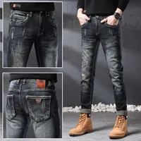Women's Jeans designer 2022 Handsome Black Scratched Men's Spring and Summer New Slim Fit Small Feet Elastic Straight Long Pants IDEG