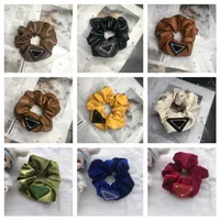Women girls designer scrunchies womens baby girl students inverted triangle logo hair clips bands fashion Luxury PU hairbands hair ring rope pra and da PDA927