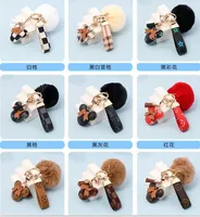 Mouse Design Car Keychain Favor Flower Bag Pingente Charm J￳ia Titular para homens Presente Fashion PU Couro de couro Acess￳rios para cadeia de chaves 4pcs/conjunto