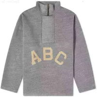 Мужские толстовка толстовок ESS ABC Пятна Припечатка Zip High Seck Sweater Серый простой универсальный зимний тренд.