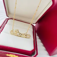 Collar de diamante completo Joyas de diseño clásico Diseño de lujo aristocrático Material sub-oro Electroplatando oro de 18 km con ojos esmeraldas Dominante de oro Leopardo