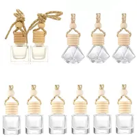 Biberón de perfume de automóviles adornos colgantes de aceites esenciales difusor 12 diseños fragancia de ambientador de aire botella de vidrio vacío