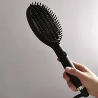 Massage peigne glide chauffer la brosse à cheveux un pas de séchoir de sèche-linge