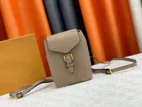 Projektantka torebka torebka malutka 80738 Mini plecak z korpusem drukowane logo luksusowy kolor kolorów 2022 Torba na ramię może pomieścić kartę banku telefonu komórkowego